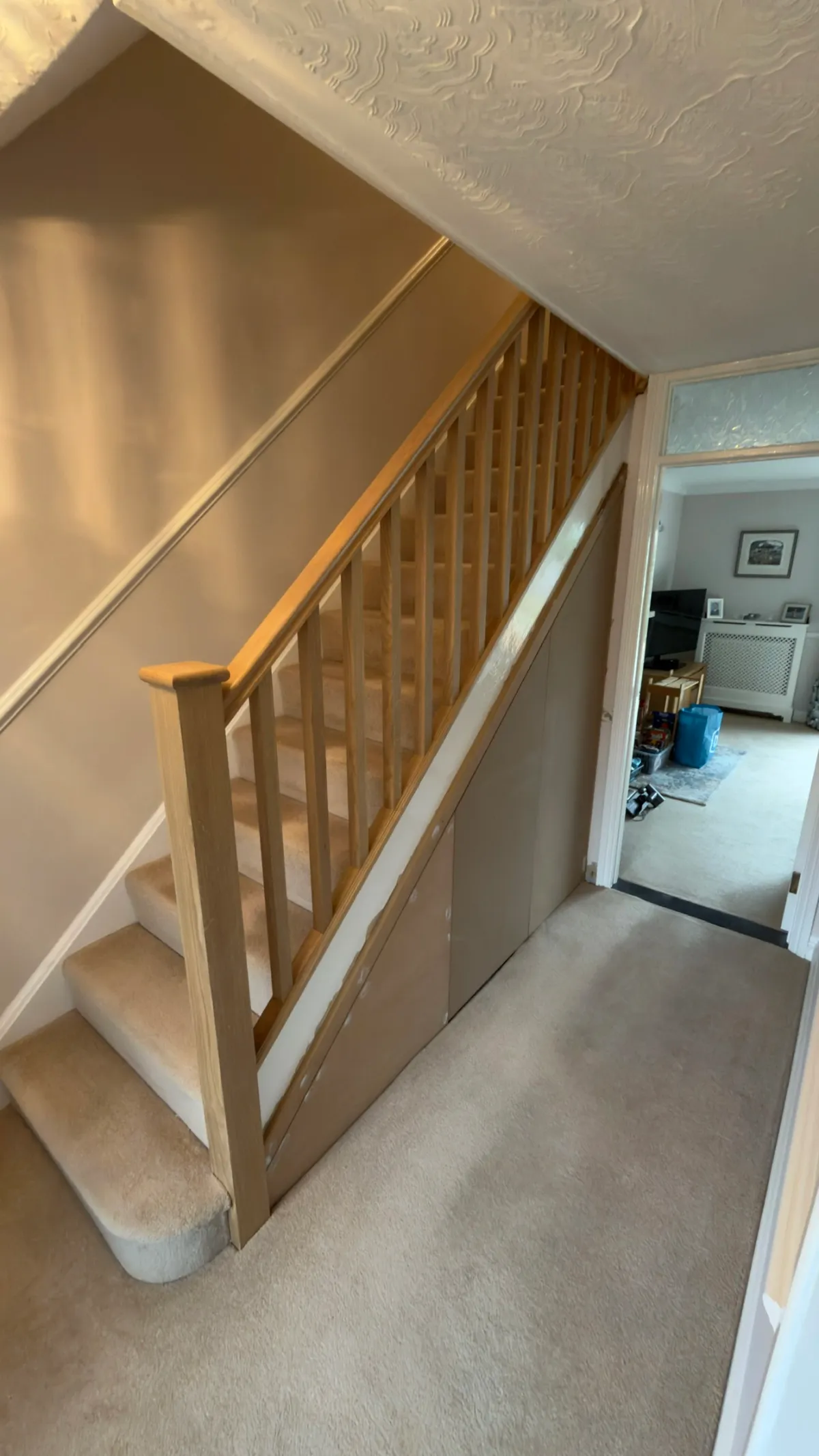 Oak staircase upgrade and understairs storage in Lordswood